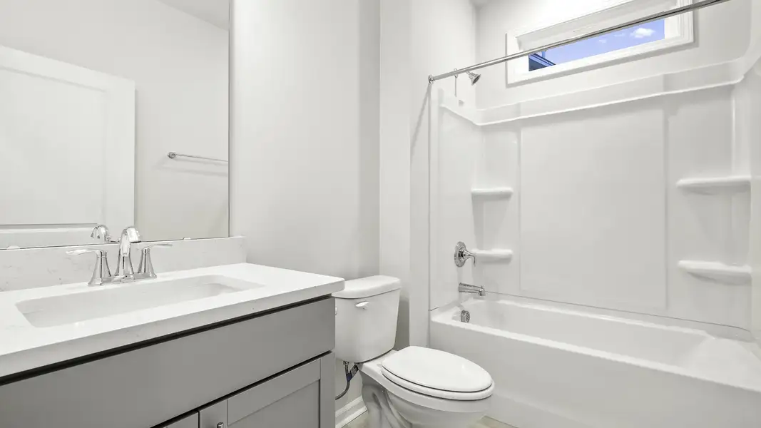 Furnished interior view inside a new home in The Villas at Kinsley, Jamestown (Image 7).