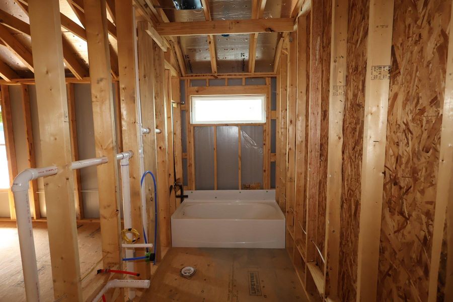 In-progress construction of a new home in Dunham Pointe, Cypress, TX (Image 26).