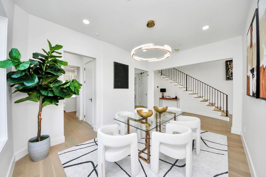 This defined layout creates an elegant setting for gatherings while maintaining a natural flow between spaces.