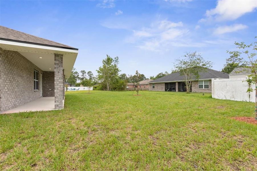 Exterior details and patio area of a home in Palm Coast, Palm Coast (Image 18).
