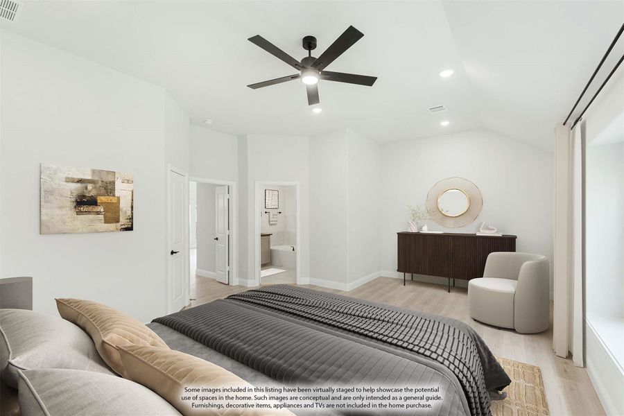 Bedroom with ceiling fan, light wood floors, and ensuite bathroom doorway visible