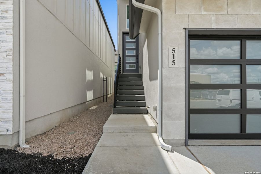 Exterior details and patio area of a home in Centero at Stone Oak, San Antonio (Image 3).