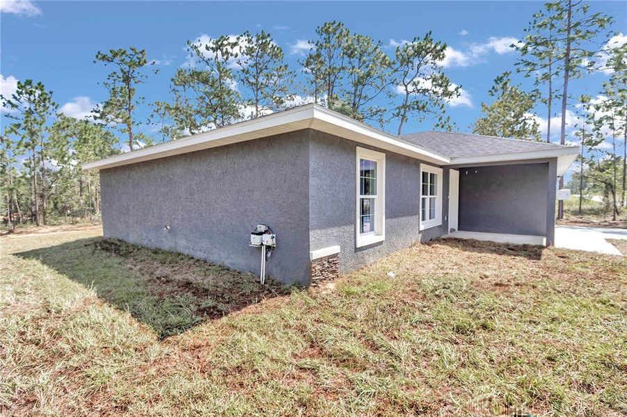 Front exterior of a new home in , Ocala, FL, highlighting curb appeal (Image 2).
