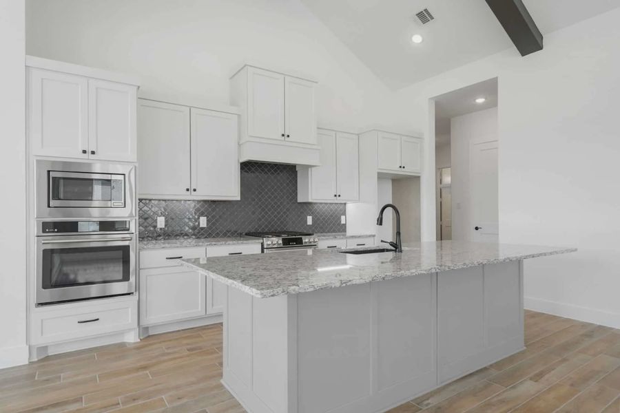 Representative furnished interior of a home built from the Malibu by Chesmar Homes in Fulshear Lakes, Fulshear (Image 9).