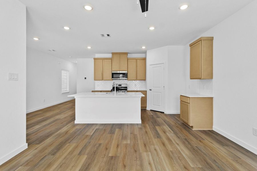 Furnished interior view inside a new home in Grand West, Houston (Image 6).