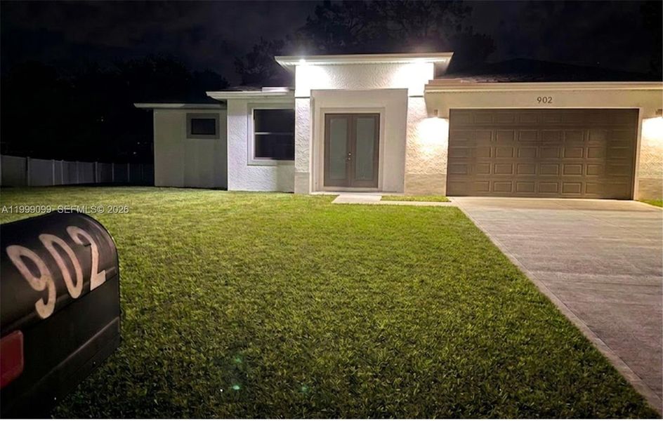 Exterior details and patio area of a home in , Lehigh Acres (Image 4). Exterior details and patio area of a home in , Lehigh Acres (Image 4).