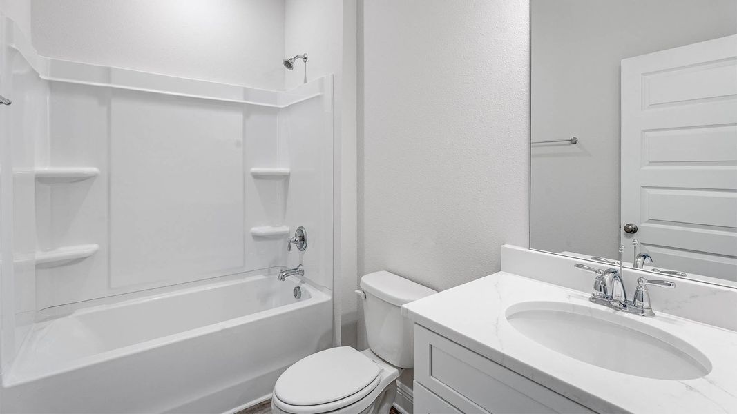 Representative furnished interior of a home built from the The Delray by D.R. Horton in Buffer Farms, Port Saint Joe (Image 6).