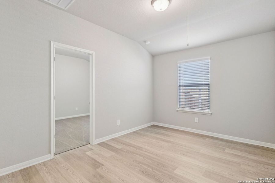 Spacious, unfurnished interior of a new home in Estancia Ranch - Premier Series, San Antonio (Image 35).
