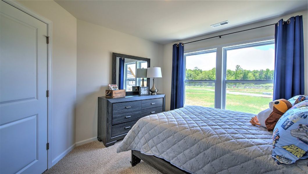 Furnished interior view inside a new home in Townes at Tap Root Farms, Fletcher (Image 23).