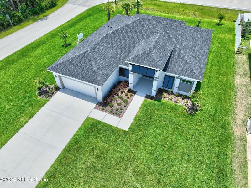 Front exterior of a new home in , Palm Coast, FL, highlighting curb appeal (Image 30).