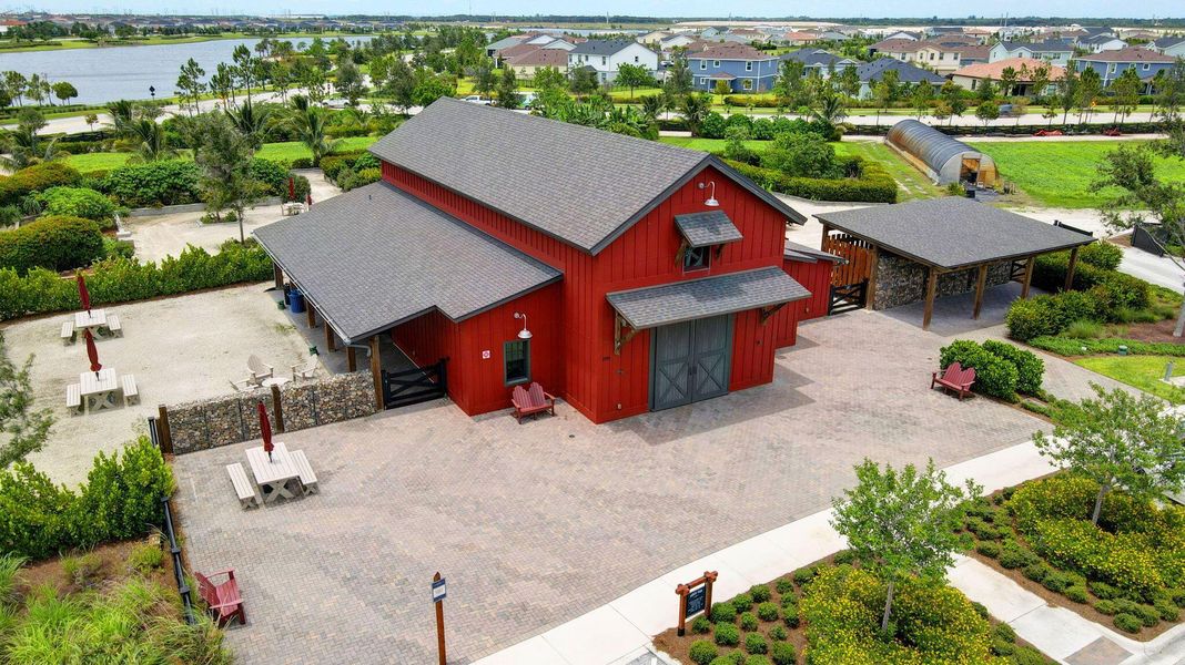 Front exterior of a new home in , Loxahatchee, FL, highlighting curb appeal (Image 24).