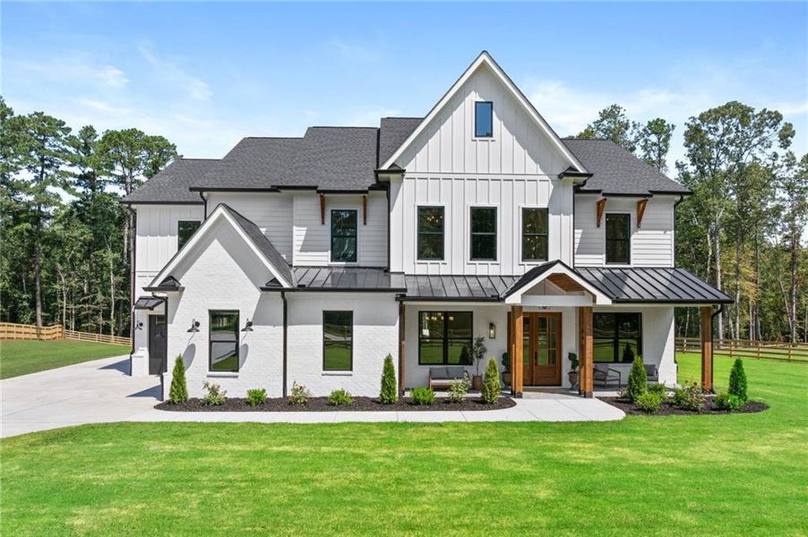 Front exterior of a new home in , Dacula, GA, highlighting curb appeal (Image 29).
