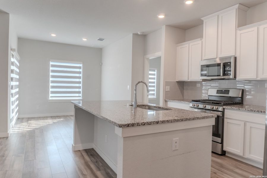 Furnished interior view inside a new home in The Meadows at Hunters Ranch, San Antonio (Image 11). Furnished interior view inside a new home in The Meadows at Hunters Ranch, San Antonio (Image 11).