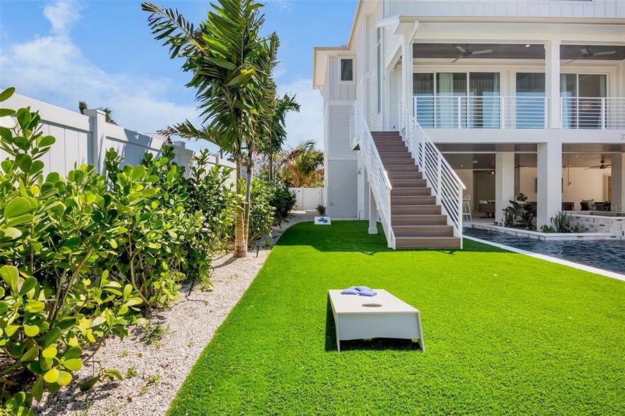 Front exterior of a new home in , Anna Maria, FL, highlighting curb appeal (Image 26).