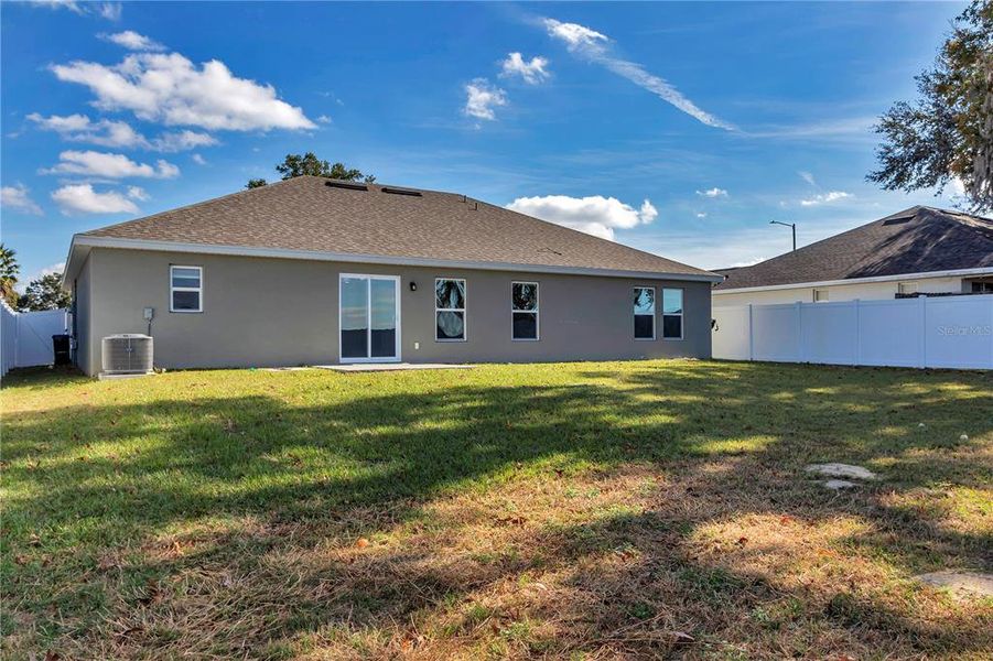 Exterior details and patio area of a home in Diamond Ridge, Belleview (Image 24).