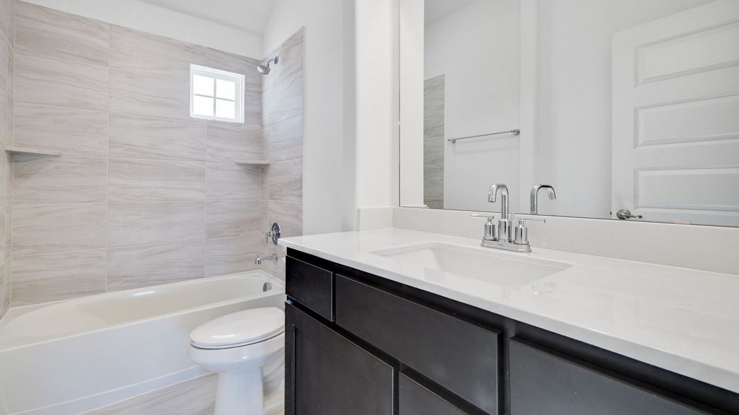Representative furnished interior of a home built from the Stanford by DRB Homes in Brookewater, Rosenberg (Image 16).