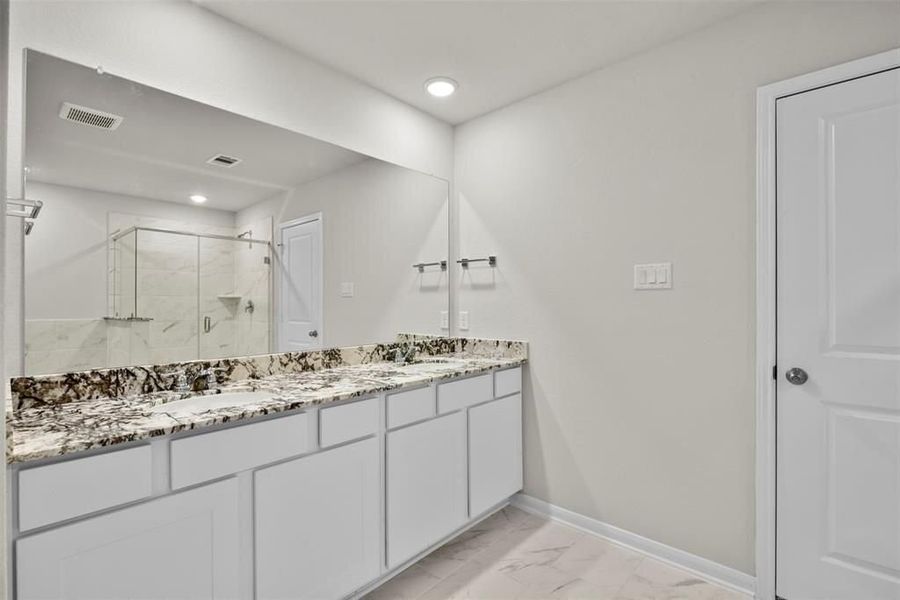 Furnished interior view inside a new home in Sunterra, Katy (Image 27). Furnished interior view inside a new home in Sunterra, Katy (Image 27).