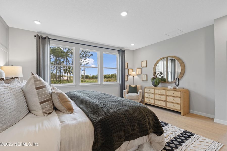 Furnished interior view inside a new home in The Cypress Series at Reserve East, Flagler Beach (Image 31).