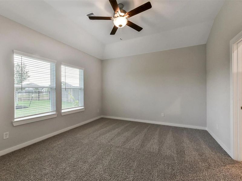 Spacious, unfurnished interior of a new home in Sunterra, Katy (Image 21).