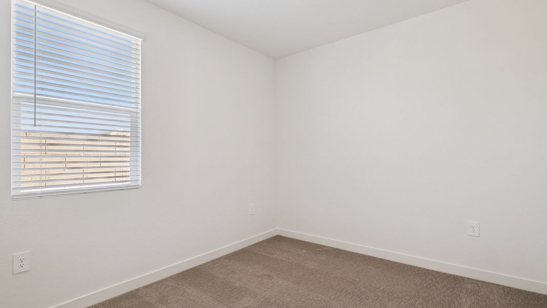 Spacious, unfurnished interior of a new home in The Ridge at Stone Butte, Phoenix (Image 28).