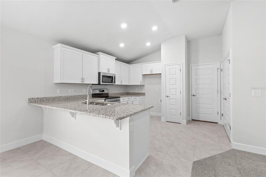 Representative furnished interior of a home built from the 1368 by Adams Homes in Winding Oaks, Weeki Wachee (Image 6).