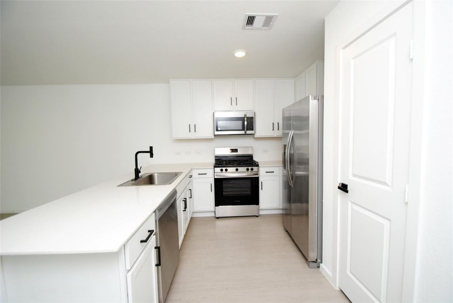 Furnished interior view inside a new home in Wharton Lakes, Wharton (Image 7).