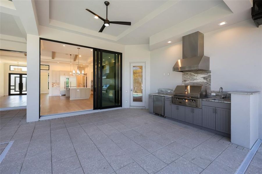 Exterior details and patio area of a home in Wild Blue at Waterside, Sarasota (Image 4). Exterior details and patio area of a home in Wild Blue at Waterside, Sarasota (Image 4).