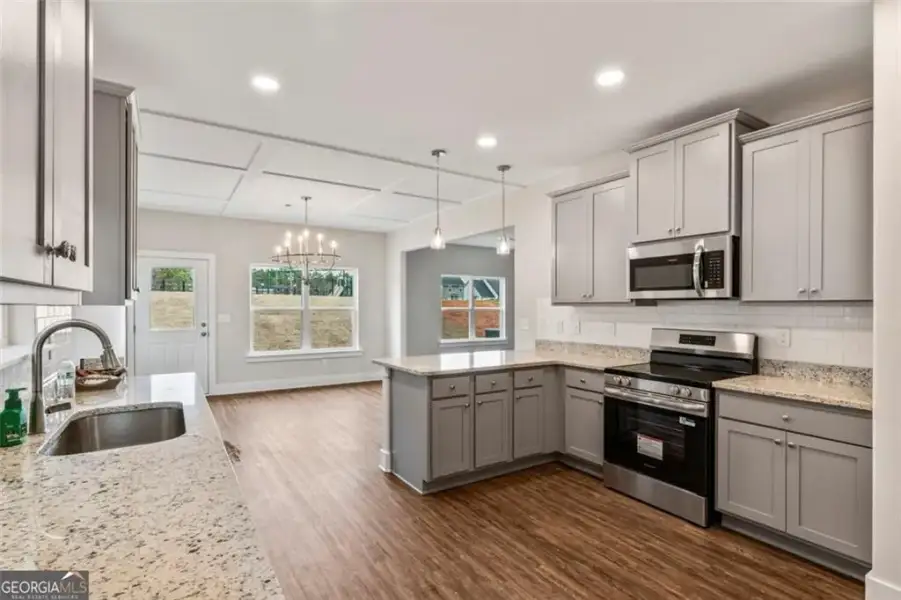 Furnished interior view inside a new home in , Hampton (Image 6).