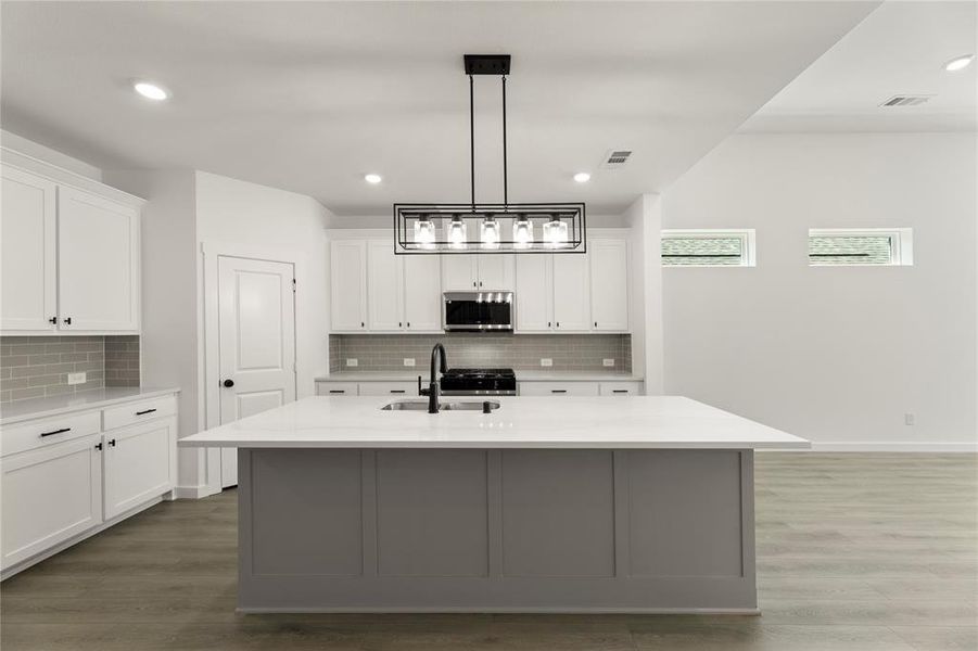 Furnished interior view inside a new home in Willow Grove, Melissa (Image 5). Furnished interior view inside a new home in Willow Grove, Melissa (Image 5).