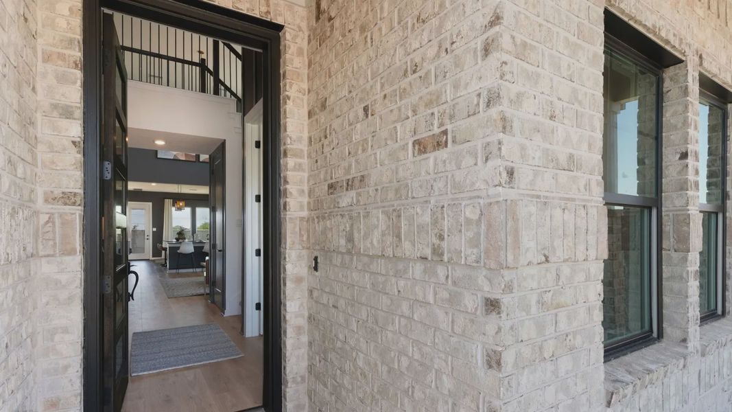 Representative exterior details of a home built from the Leilana by Chesmar Homes in The Grove at Blackhawk, Pflugerville (Image 2). Representative exterior details of a home built from the Leilana by Chesmar Homes in The Grove at Blackhawk, Pflugerville (Image 2).