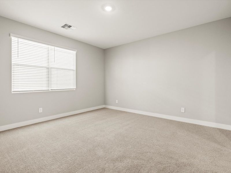 Spacious, unfurnished interior of a new home in Entrada Signature Series, Tolleson (Image 15).