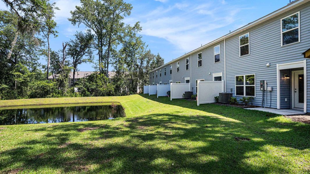 Exterior details and patio area of a home in The Townes at Amber Bluff, Conway (Image 2).