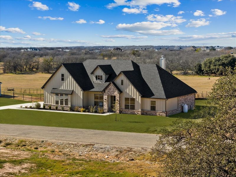 Front exterior of a new home in Brock Heights, Brock, TX, highlighting curb appeal (Image 35).