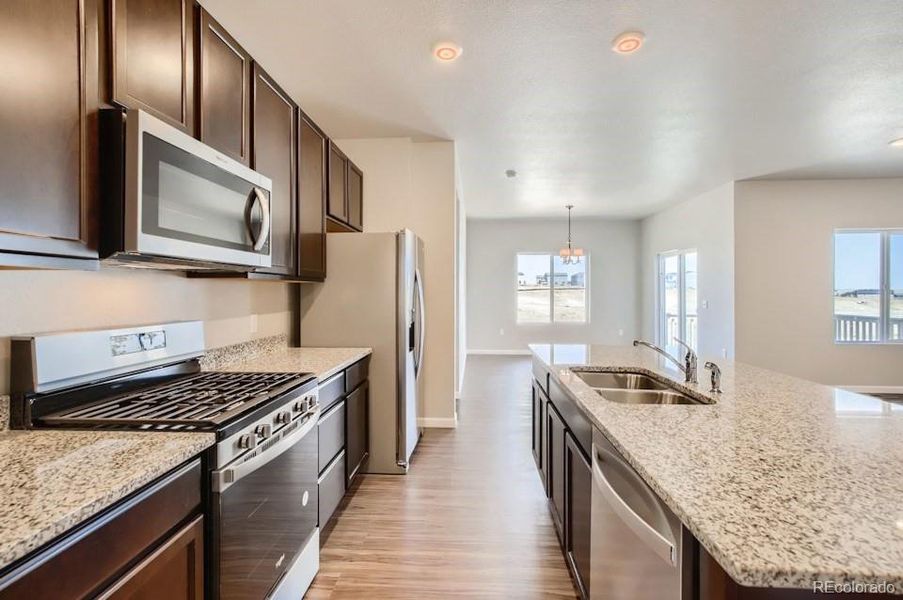 Furnished interior view inside a new home in Red Barn Meadows, Mead (Image 7).
