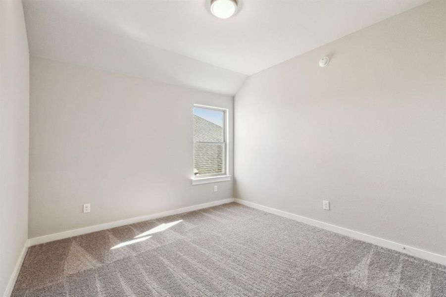 Bedroom in the Morrison home plan by Trophy Signature Homes – REPRESENTATIVE PHOTO Bedroom in the Morrison home plan by Trophy Signature Homes – REPRESENTATIVE PHOTO