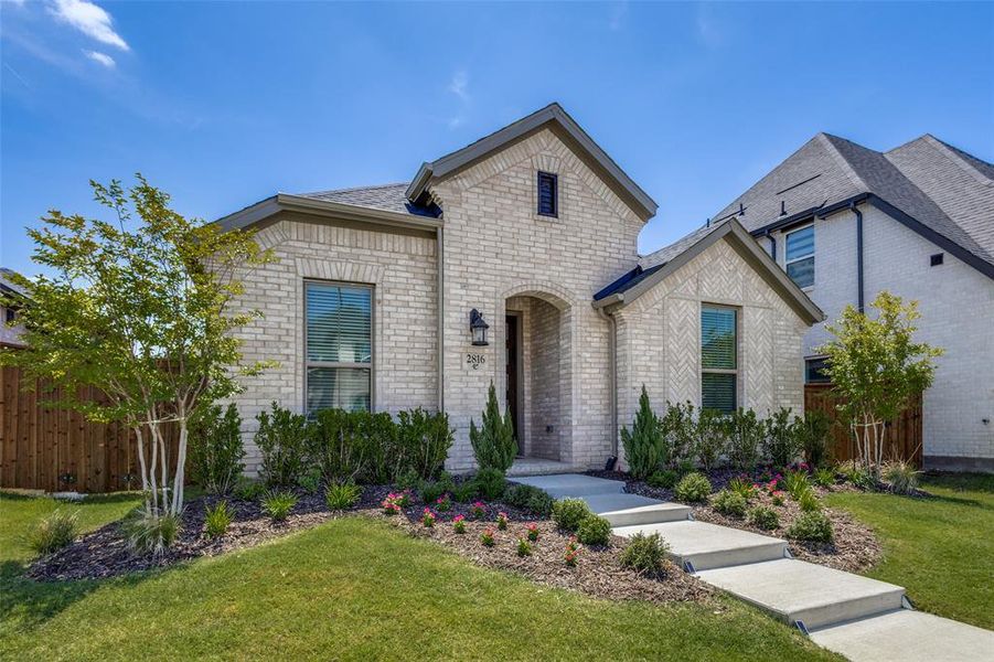 Front exterior of a new home in , Celina, TX, highlighting curb appeal (Image 19).