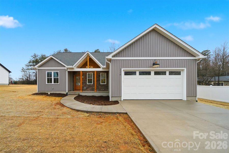 Front exterior of a new home in , Maiden, NC, highlighting curb appeal (Image 24).