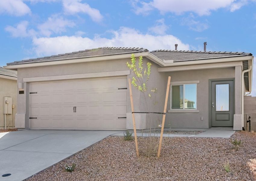 This home has a beautiful stucco exterior and offers a spacious 2-car garage.