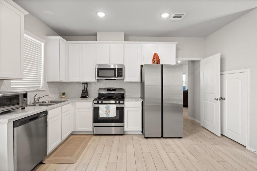 Furnished interior view inside a new home in Waterstone on Lake Conroe, Montgomery (Image 18).