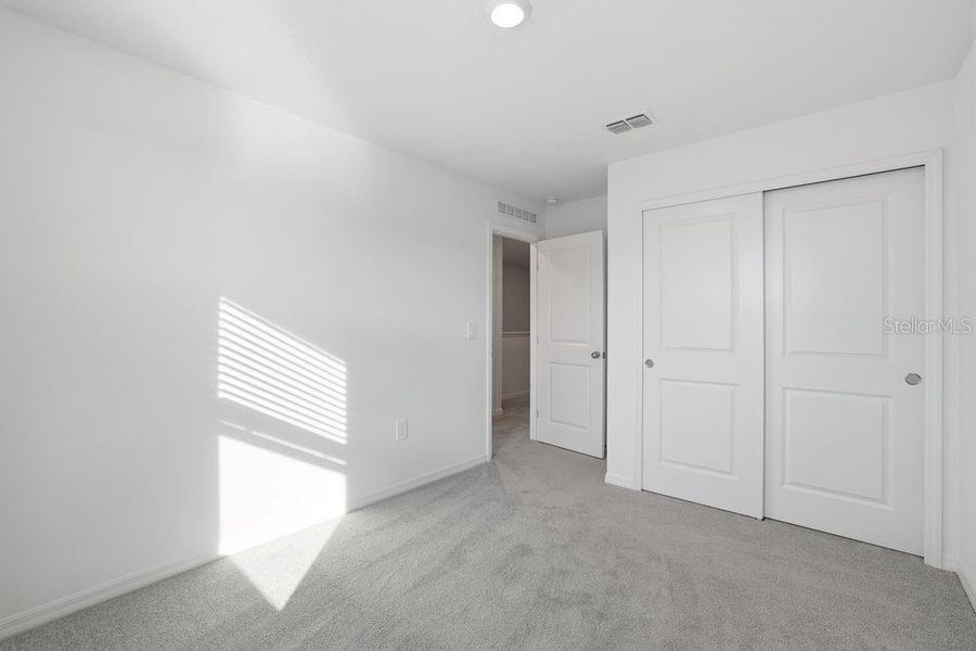 Spacious, unfurnished interior of a new home in The Towns at Firethorn, Parrish (Image 22).