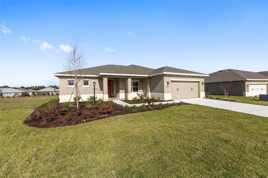 Front exterior of a new home in , Ocala, FL, highlighting curb appeal (Image 18).