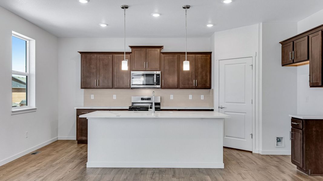 Furnished interior view inside a new home in Trails at Crowfoot, Parker (Image 8).