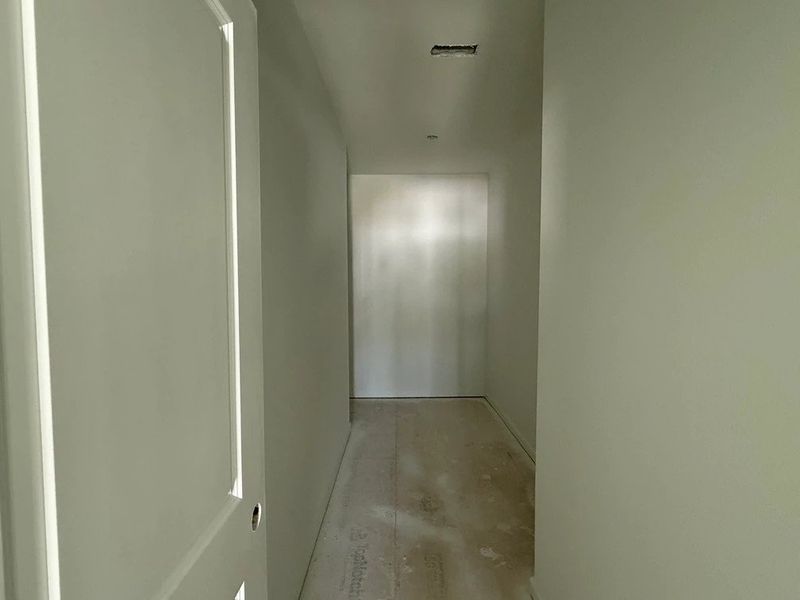 Primary Walk-In featuring the AW Collection® Timeless - Organized luxury with timeless appeal.