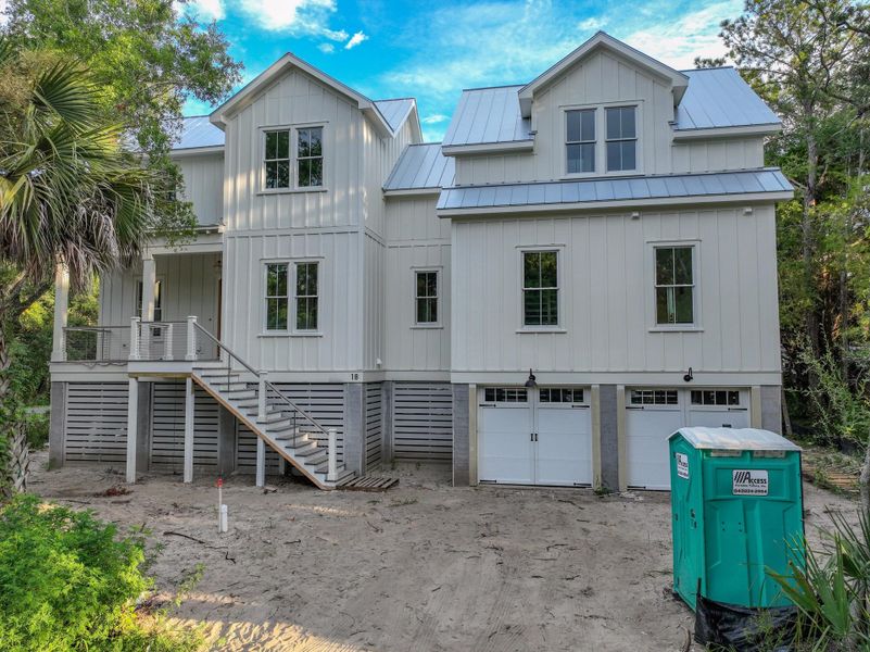 Front exterior of a new home in , Isle Of Palms, SC, highlighting curb appeal (Image 37). Front exterior of a new home in , Isle Of Palms, SC, highlighting curb appeal (Image 37).