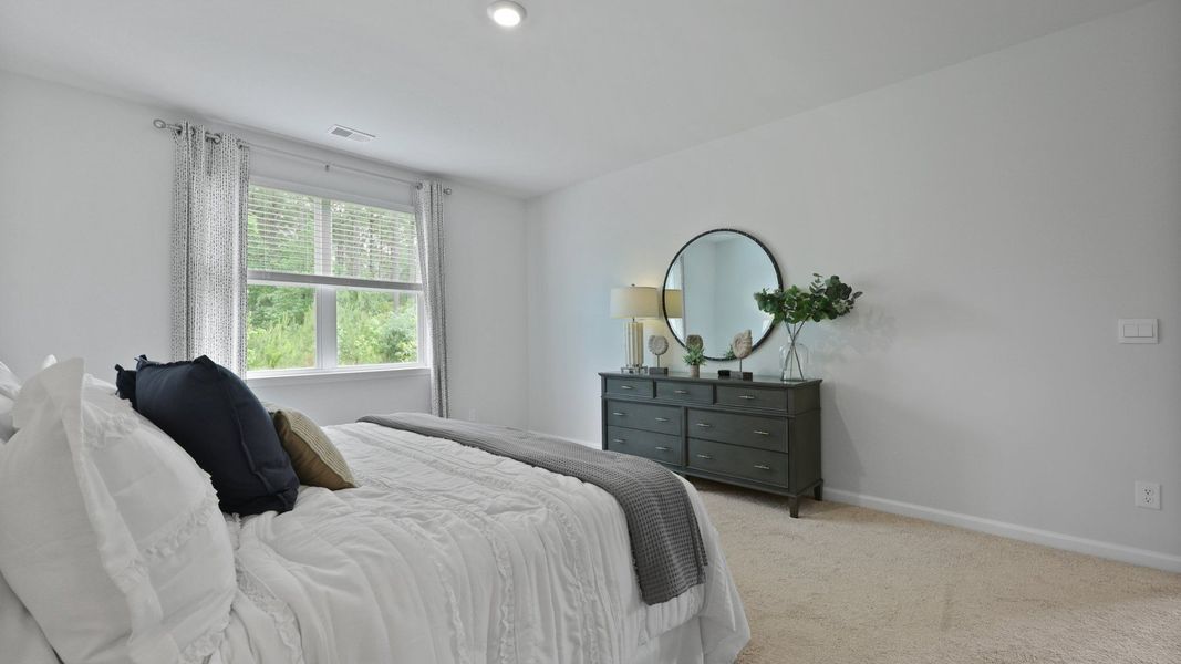 Representative furnished interior of a home built from the Glenwood by D.R. Horton in Pine Hills at Cane Bay, Summerville (Image 26).