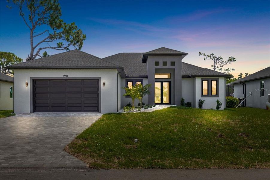 Front exterior of a new home in , Rotonda West, FL, highlighting curb appeal (Image 24). Front exterior of a new home in , Rotonda West, FL, highlighting curb appeal (Image 24).
