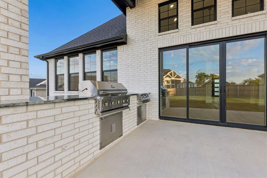 Exterior details and patio area of a home in , Argyle (Image 25).