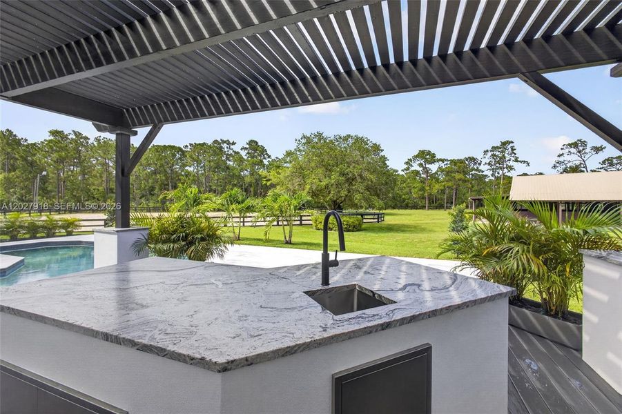 Exterior details and patio area of a home in , Palm Beach Gardens (Image 43).