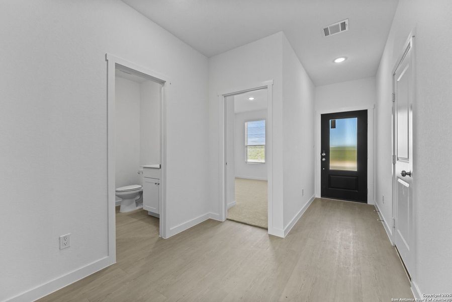 Spacious, unfurnished interior of a new home in Waterwheel: Coastline Collection, San Antonio (Image 25).