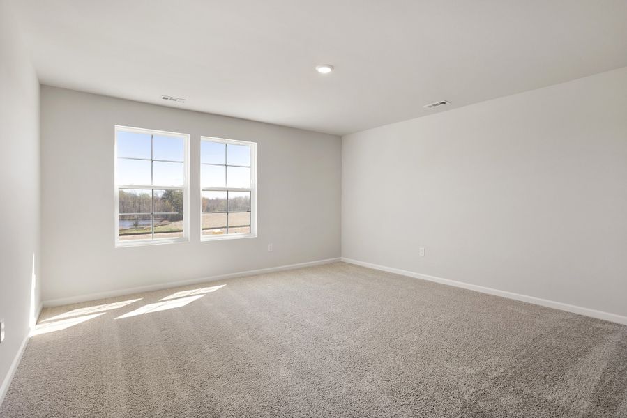 Spacious, unfurnished interior of a new home in Cambridge Reserve, Angier (Image 29).